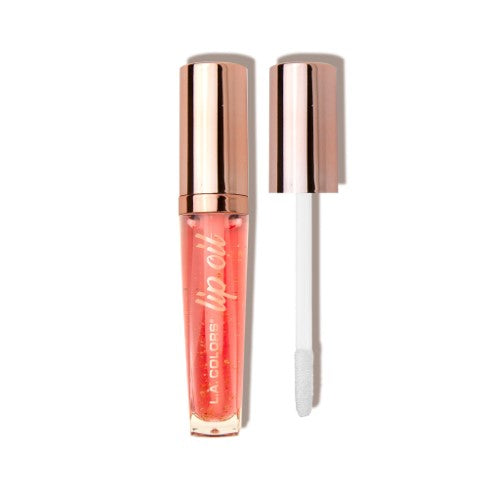 LA Colors Nourishing Lip Oil in Tangerine Twist scent, enriched with gold flakes for hydration and a soft, glossy finish.