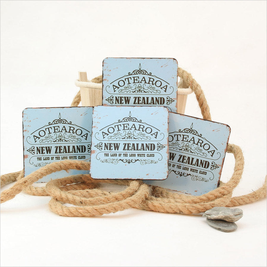 Set of 4 vibrant Kiwiana coasters celebrating New Zealand culture, made from durable MDF with natural cork base.
