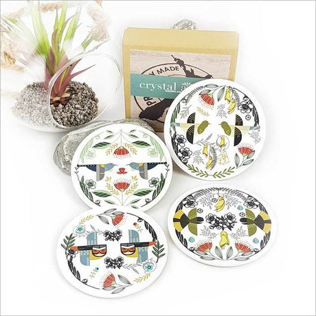 Colorful folk bird coasters, 100mm diameter, with cork base for non-slip grip and rustic charm, ideal for any decor.