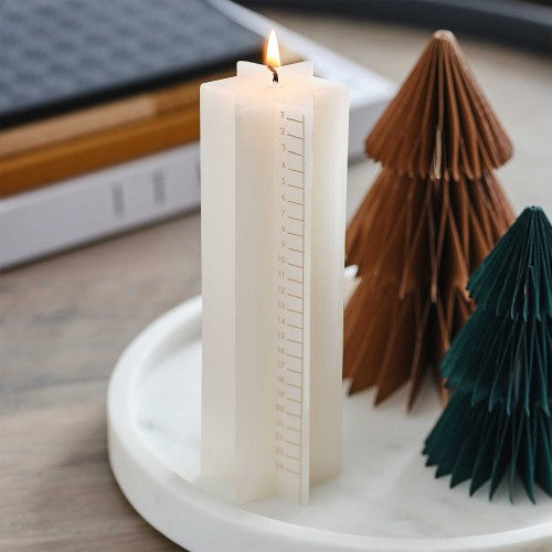 Cosy Copper Star-Shaped Advent Candle, 18cm, adds festive charm and warmth to your holiday decor and countdown.