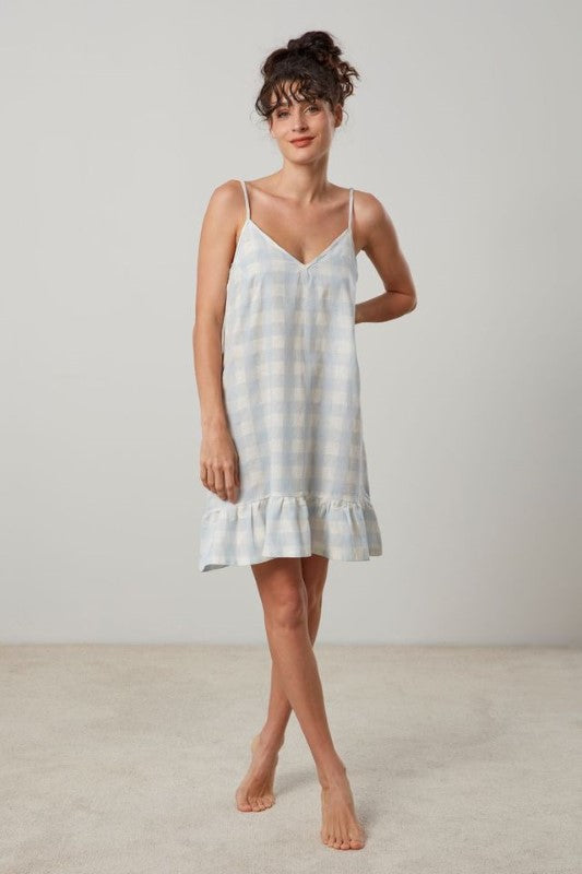 Lena Nightie by BAKSANA in blue and white check, featuring 'v' neck, adjustable straps, and frilled hem for comfort.