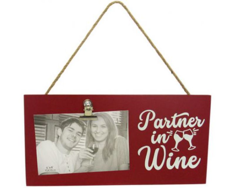 Rustic wood photo frame with twine hanger, perfect for showcasing cherished memories for wine lovers.