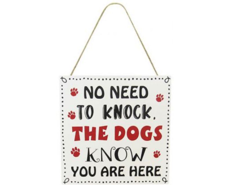 Wooden 'Dogs Know' sign with twine hanger, perfect decor for dog lovers, measuring 20 x 9 cm.