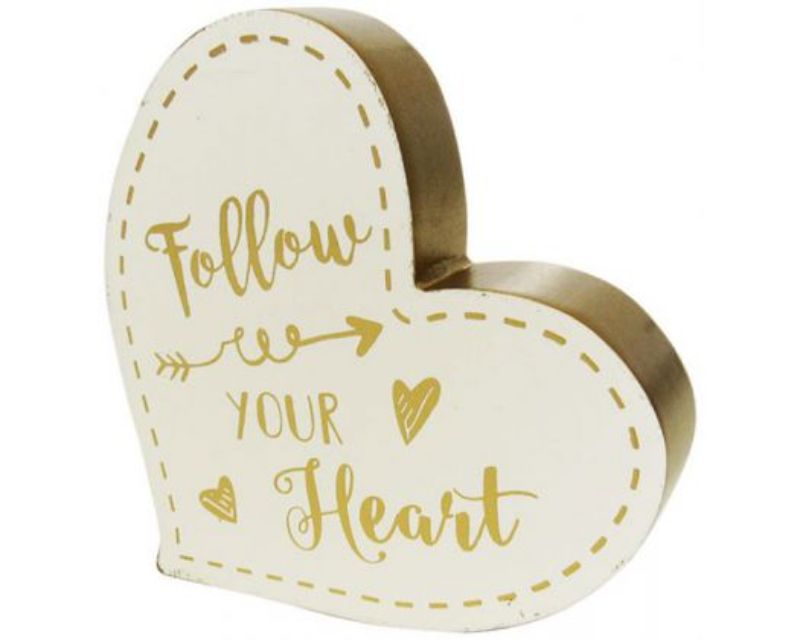 Wooden heart-shaped shelf sign with 'Follow Your Heart' phrase, perfect for uplifting decor in any space.