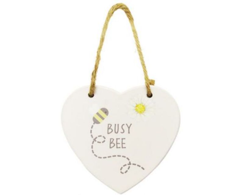 Charming heart-shaped wooden sign with twine hanger, perfect for nature-inspired decor and gifts.