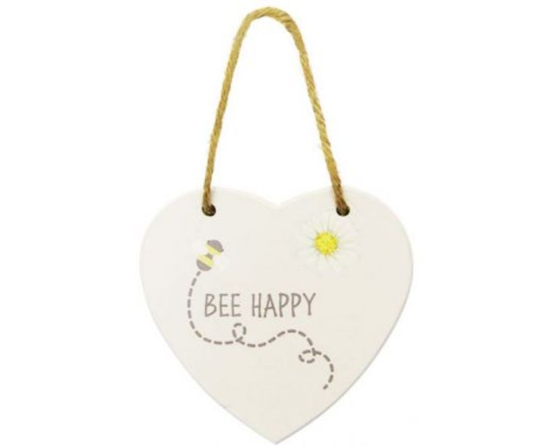 Heart-shaped wood sign with twine hanger featuring a playful bee motif, perfect for rustic home decor.