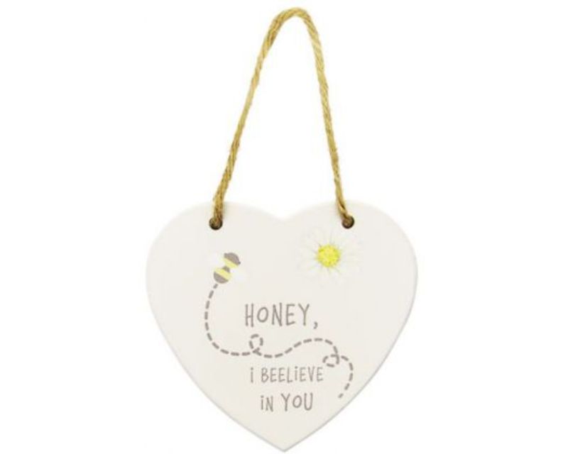 Heart-shaped wooden wall decor with twine, featuring 'Bee-lieve in Yourself' quote, perfect for nature lovers.