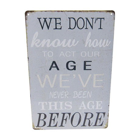 Charming 30cm x 20cm retro tin sign 'Age Before', perfect for adding whimsy to any wall decor.