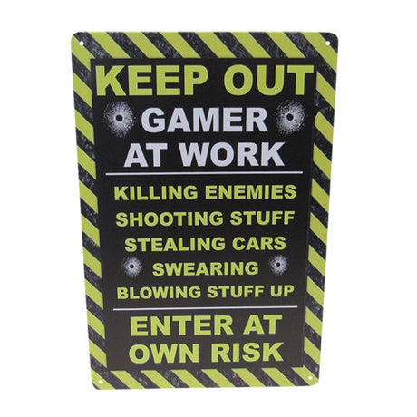 Retro-style tin sign reading 'Gamer at Work', perfect for adding character to gaming rooms or offices.
