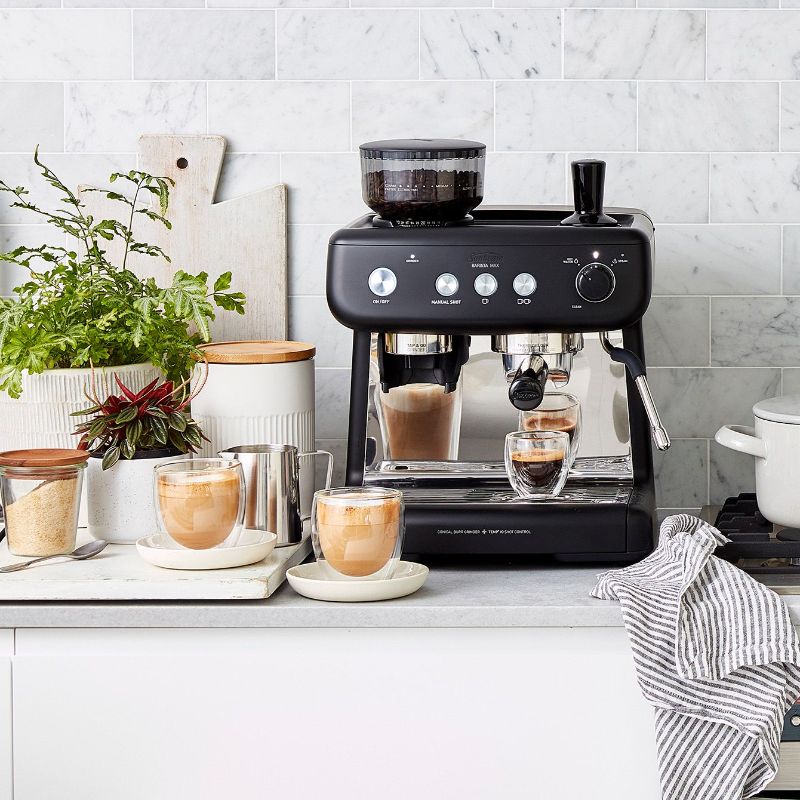 Sunbeam Barista Max Coffee Machine in black, featuring integrated grinder and 1550W heating for barista-quality espresso at home.