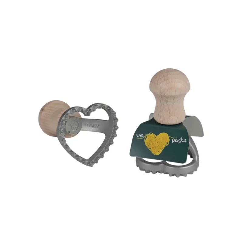 Small heart-shaped ravioli cutter with beechwood handle, perfect for crafting homemade pasta.