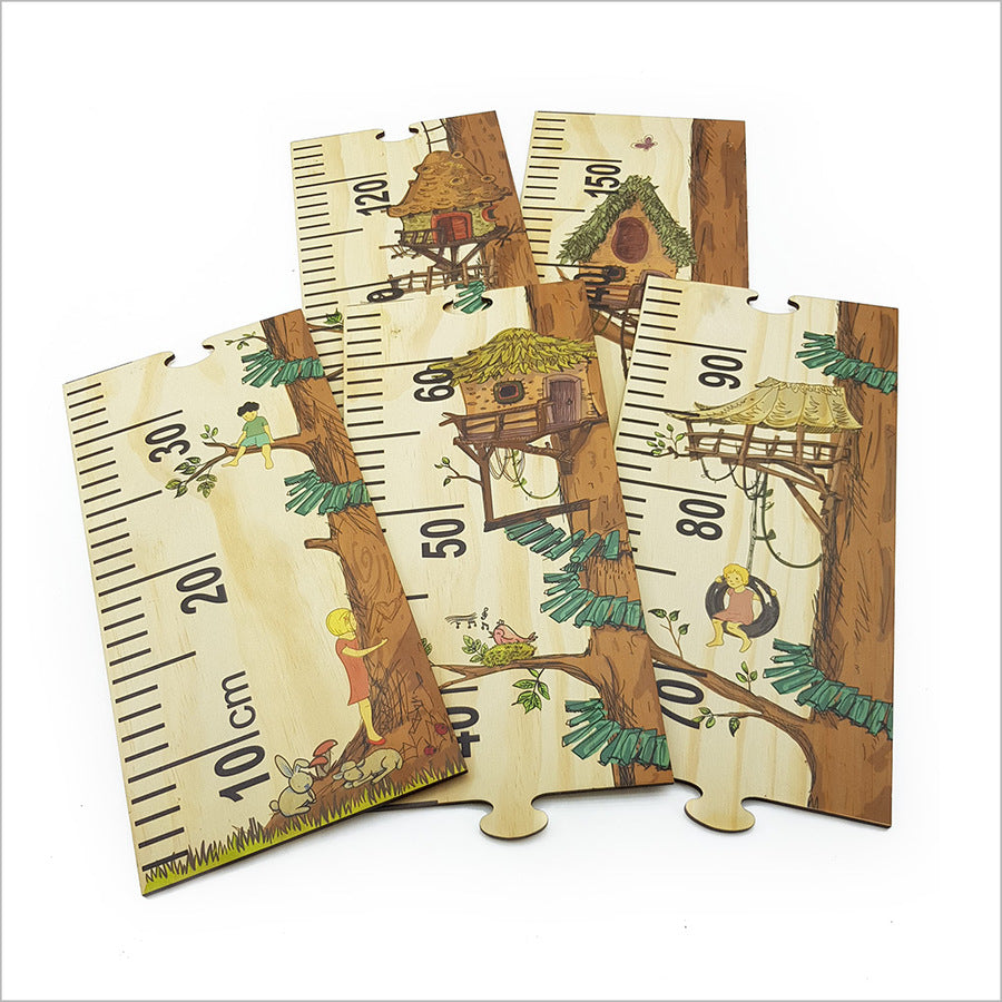 Eco-friendly treehouse growth chart ruler measuring 1.5m, features fun puzzle pieces for children’s room décor.