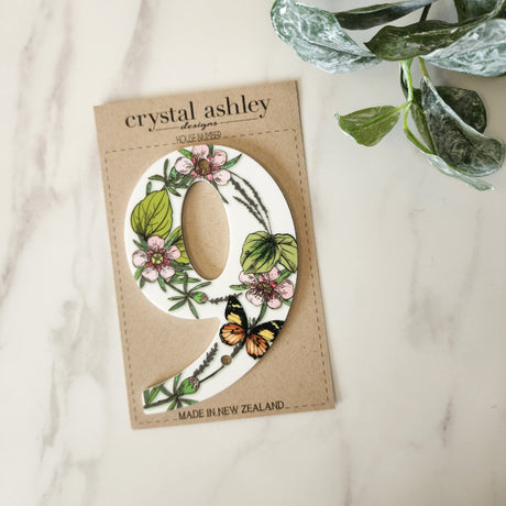 Vibrant NZ Floral house number 9 in 12cm white acrylic, perfect for enhancing curb appeal with easy installation.