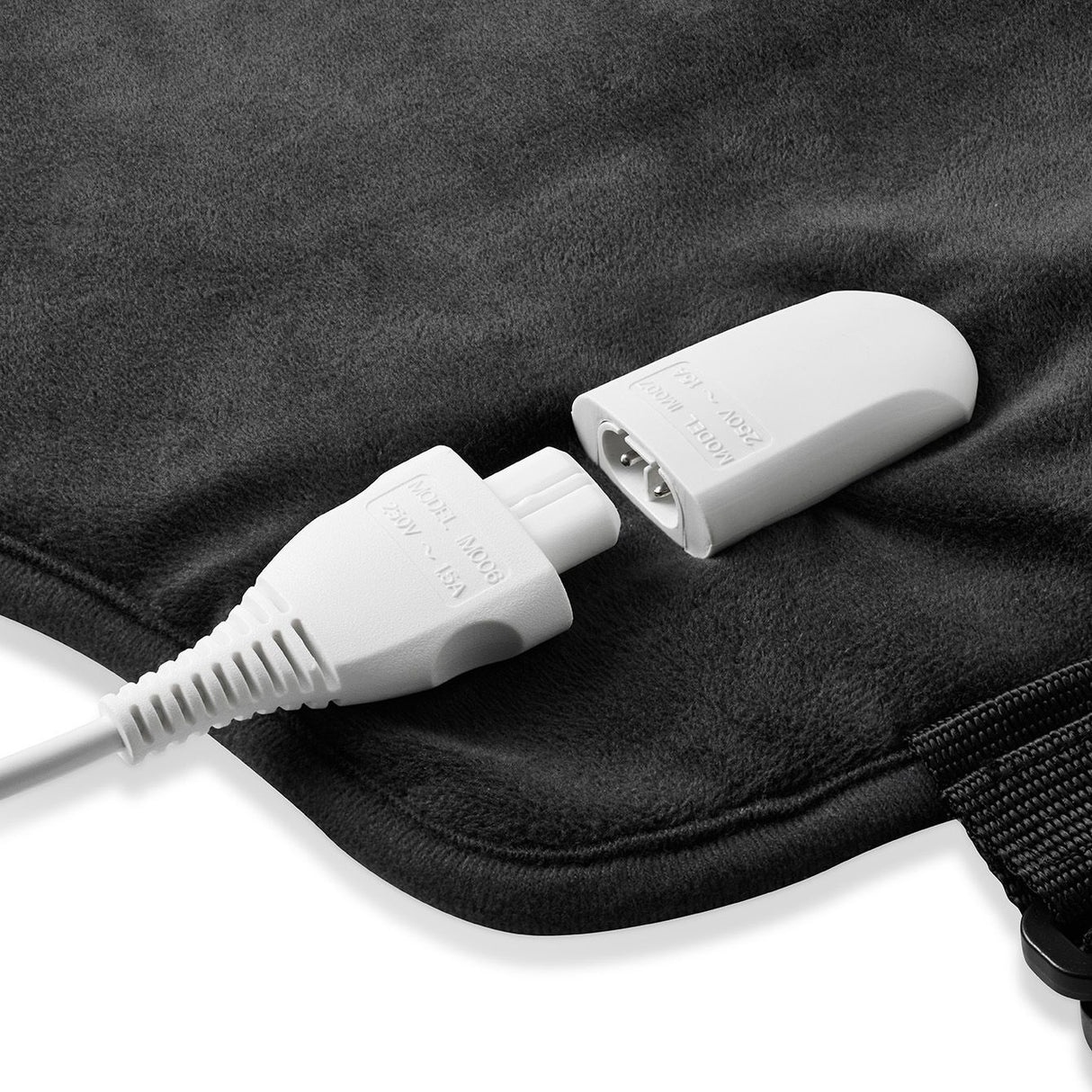 Sunbeam Lower Back Heating Pad in grey with adjustable strap, 5 heat settings, provides soothing warmth for back pain relief.