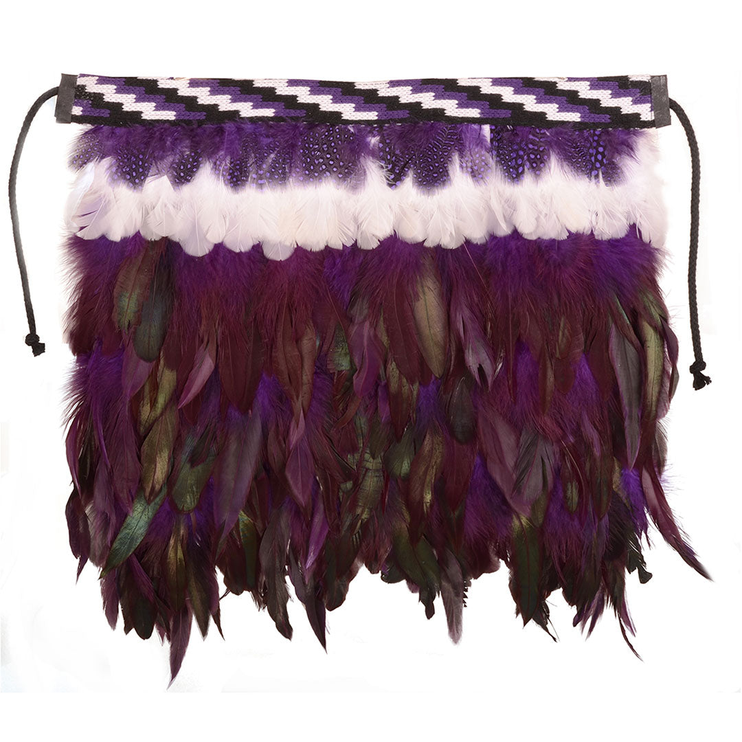 Purple Korowai christening cloak adorned with feathers and Poutama design, symbolizing growth and warmth for special occasions.