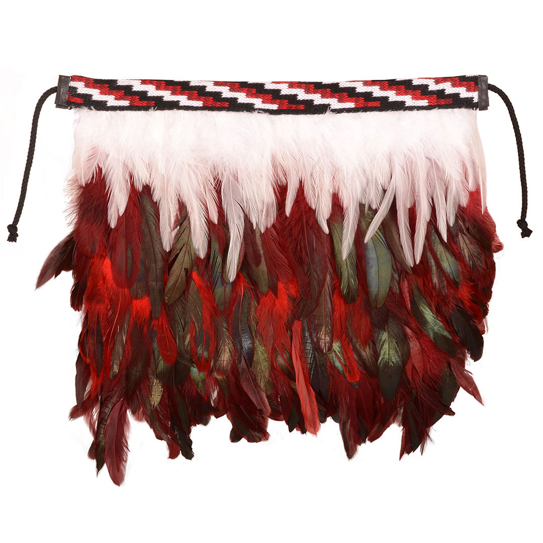 Handcrafted red korowai christening cloak with vibrant feathers and Poutama pattern, symbolizing love and cultural heritage.