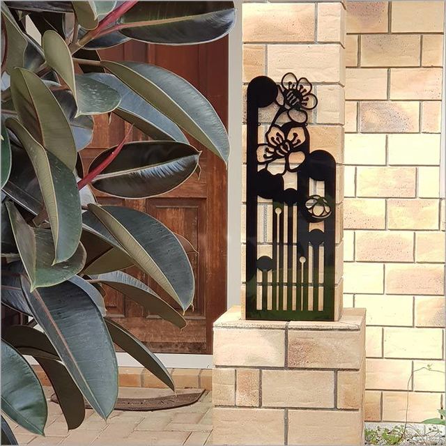 Large Koru Manuka black wall art in ACM, 790mm, celebrating New Zealand's culture and nature, suitable for indoor/outdoor use.
