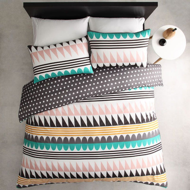 Single duvet cover set in slate grey with white piping, featuring a reversible design for versatile bedroom style.