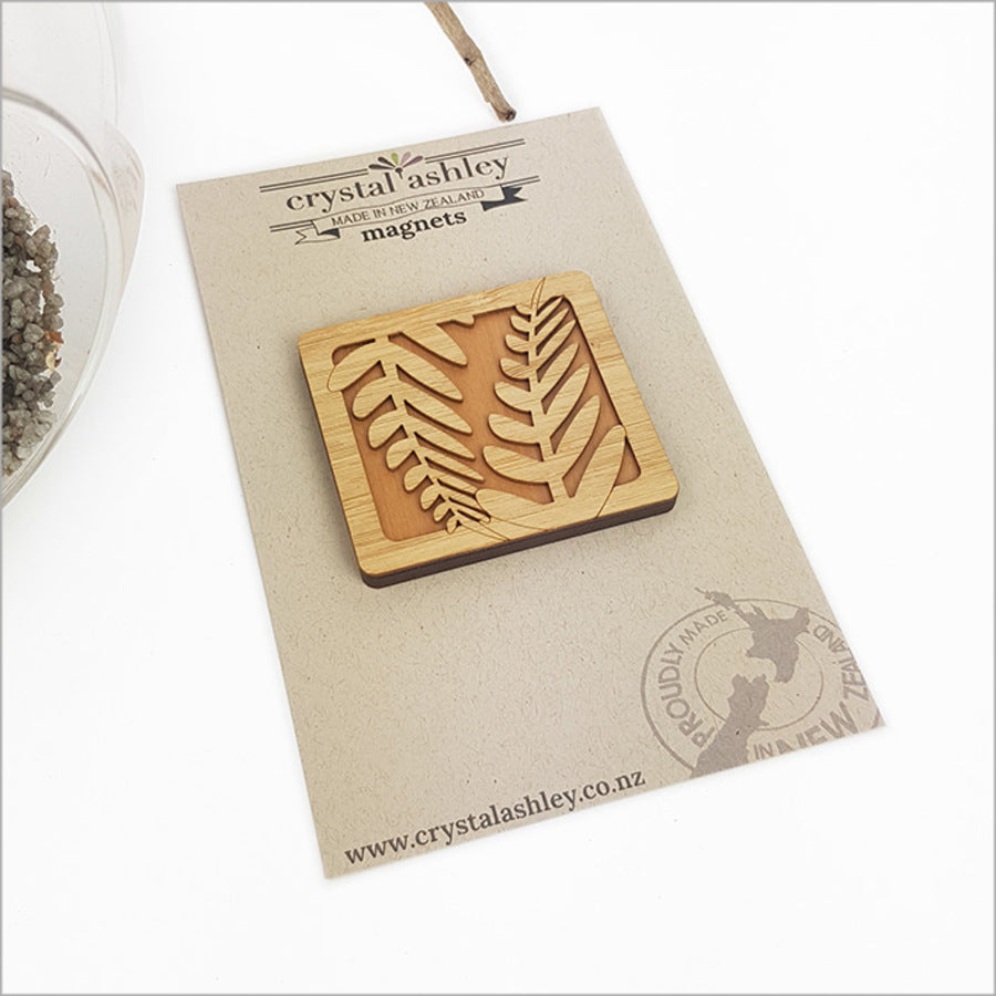 Rectangle fern magnet made of sustainable NZ Rimu and bamboo veneer, ideal for showcasing photos and notes.