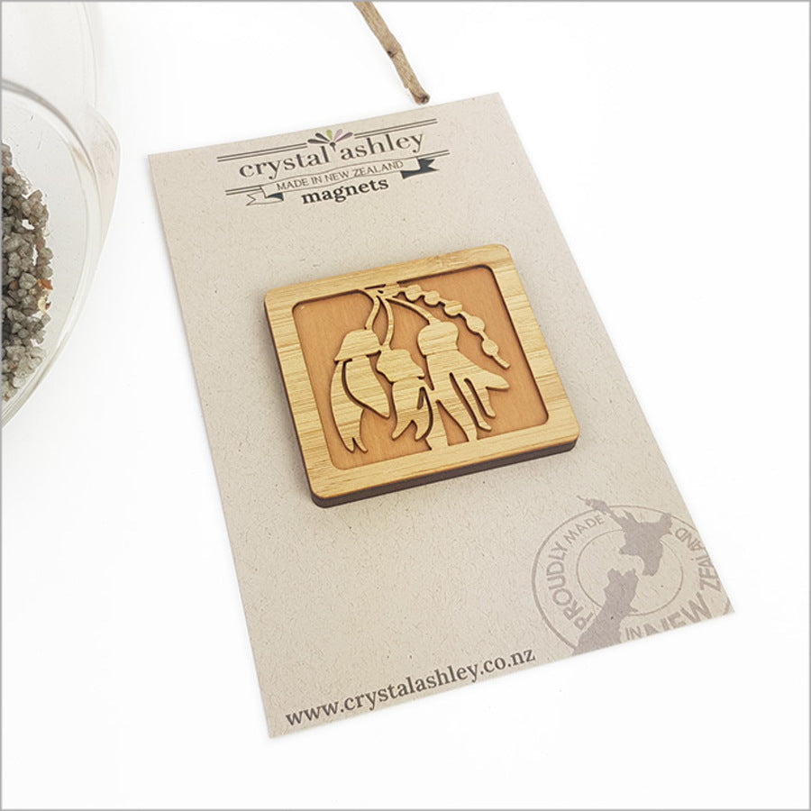 Rectangle Kowhai Flower Magnet (59mm) made from NZ Rimu, showcasing vibrant New Zealand flora, perfect for home decor.