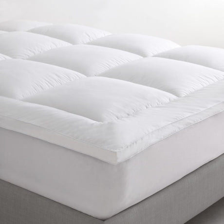 Logan & Mason Pillowtop Mattress Topper with plush microfibre fill and breathable cotton cover for enhanced queen bed comfort.