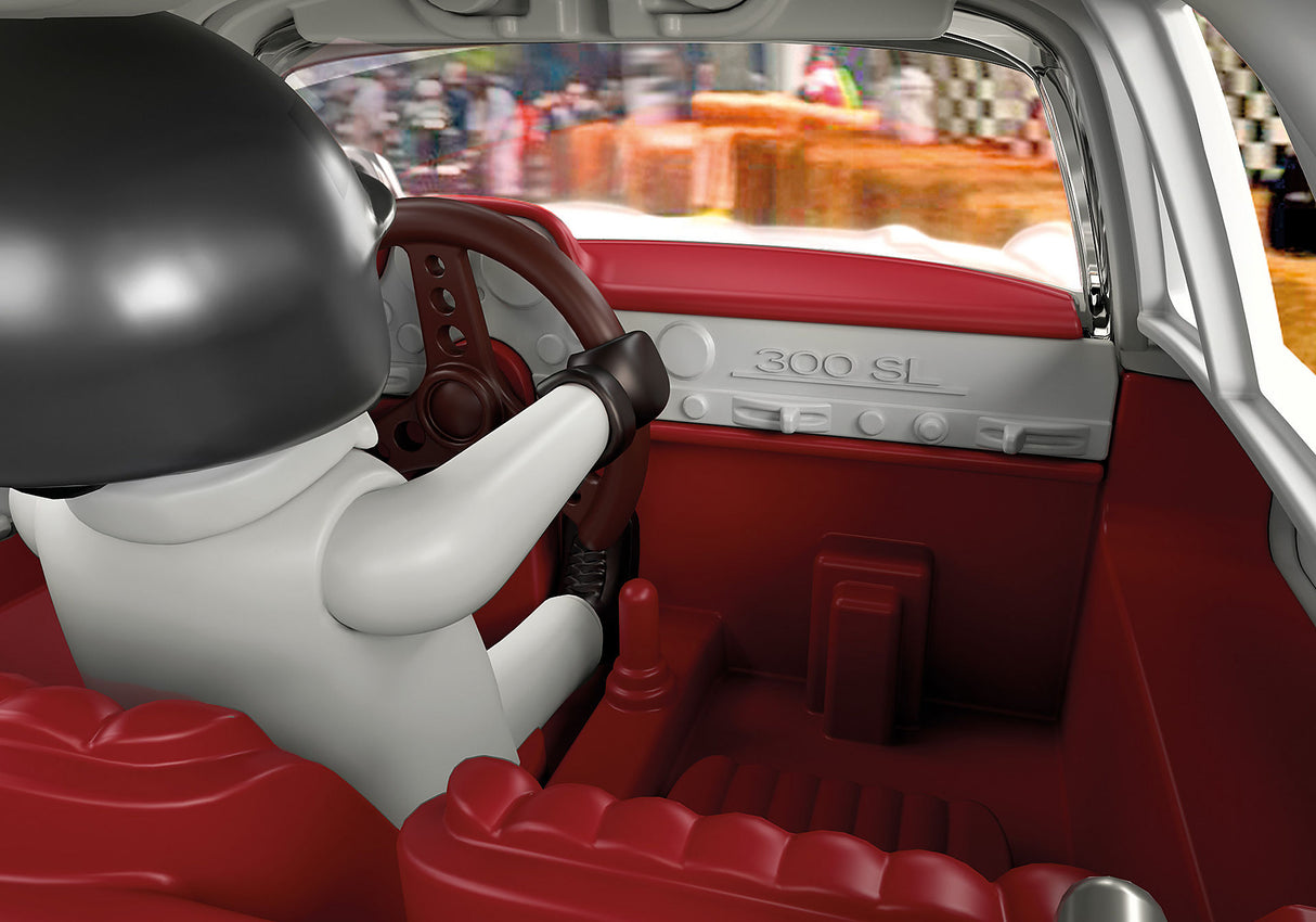 Playmobil Mercedes-Benz 300 SL model with gullwing doors, chrome details, figures, and racetrack accessories for imaginative play.