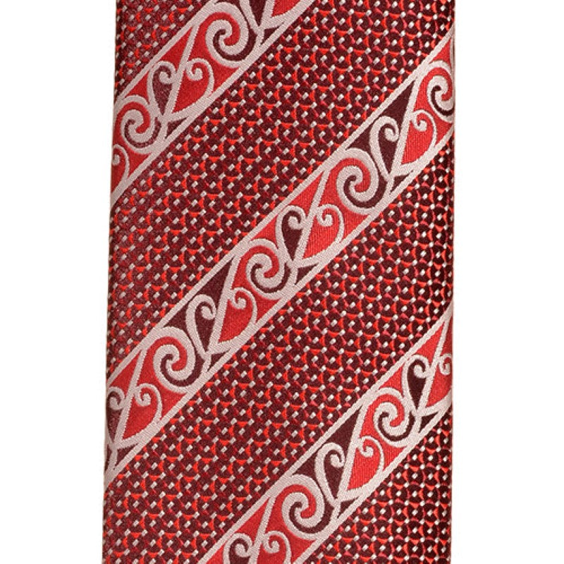 Elegant red Maori necktie featuring intricate Kowhaiwhai pattern, perfect for formal and casual occasions.
