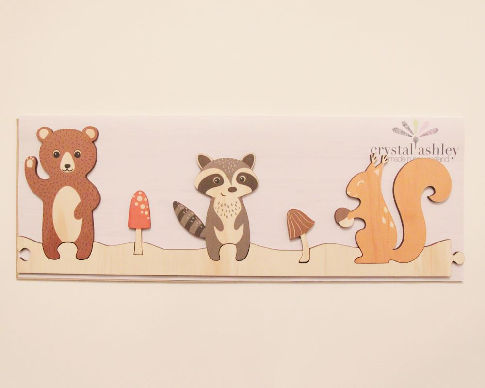 Enchanting jigsaw wall art featuring a magical forest theme, perfect for kids' rooms with customizable arrangement options.
