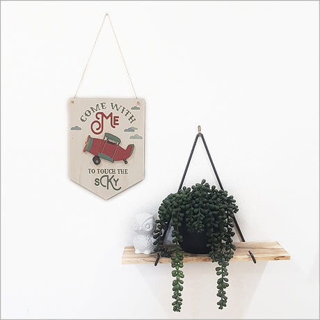 Eco-friendly wall art featuring a printed pine plane flag, perfect for aviation lovers and rustic decor.