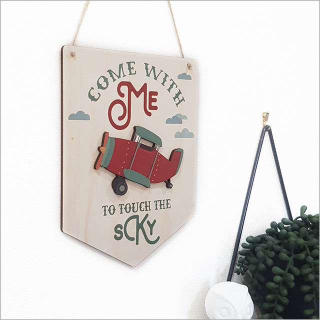 Eco-friendly wall art featuring a printed pine flag plane, ideal for aviation lovers and rustic decor enthusiasts.