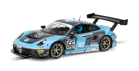 Scalextric Porsche 911 GT3 British GT '22 model in blue and grey, designed for racing enthusiasts and collectors.
