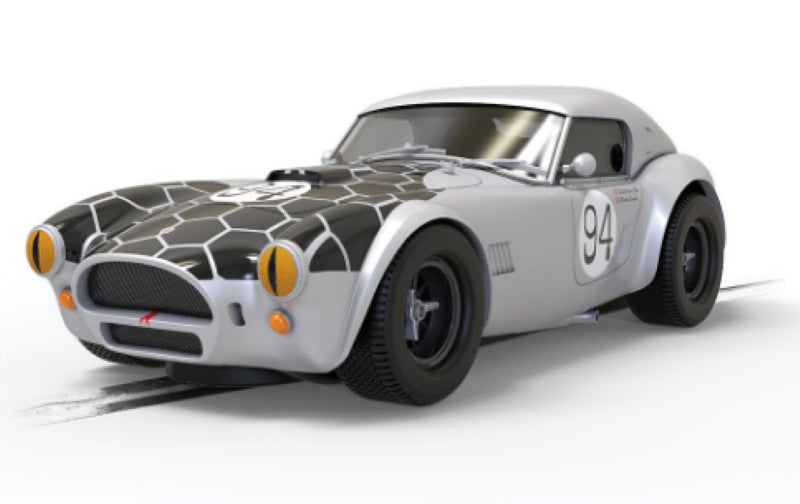 Scale model of the Shelby Cobra 289 Snake Eyes showcasing its iconic design and snake motif, perfect for collectors.