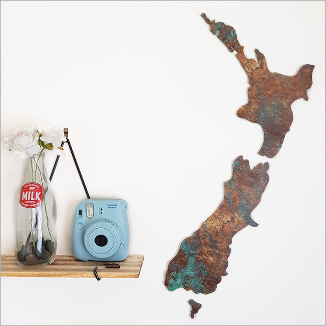 Small wall art featuring New Zealand maps with a unique copper patina finish, ideal for home or office decor.