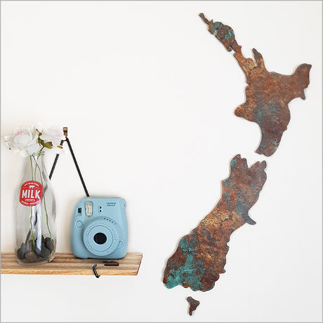 Small wall art featuring New Zealand maps with a unique copper patina finish, ideal for home or office decor.