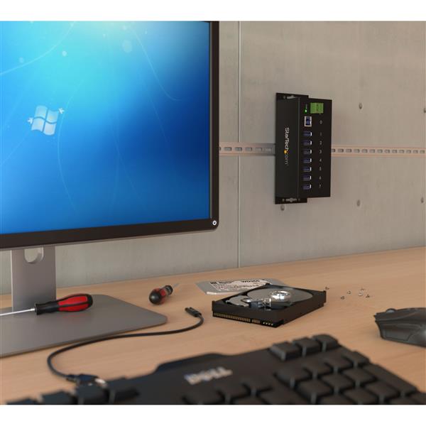 7-Port USB 3.0 industrial hub with ESD protection, durable metal design, fast charging up to 35W, ideal for harsh environments.