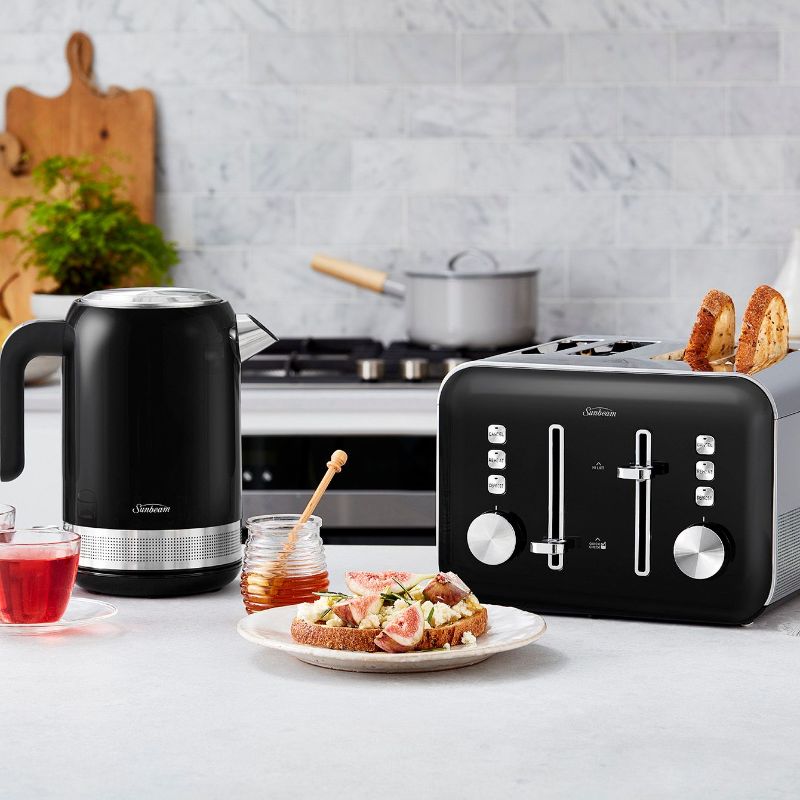 Sleek black Simply Shine™ 4 Slice Toaster with electronic browning controls and convenient features for perfect toasting.