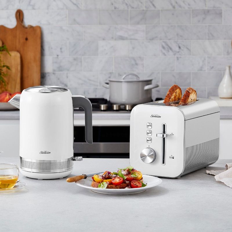 Elegant white 2 slice toaster with 9 browning settings, defrost and reheat functions, and a stylish glossy finish.