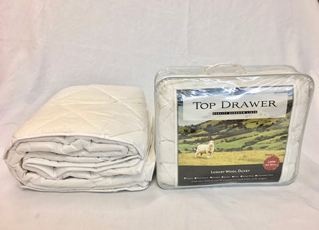Luxurious 450GSM New Zealand wool duvet inner for double beds, offering year-round comfort and breathability.