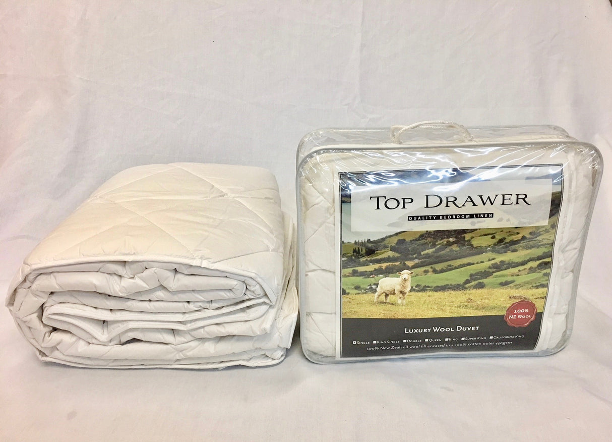 Luxurious 450GSM queen wool duvet inner for year-round comfort, made with 100% New Zealand wool in a breathable cotton cover.