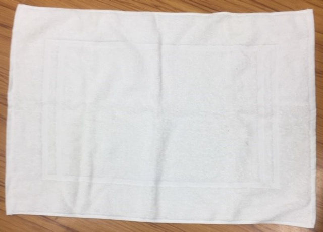 Luxurious Trinity White Bath Mat, 100% cotton, soft, absorbent, 48x73cm, perfect for any bathroom decor.