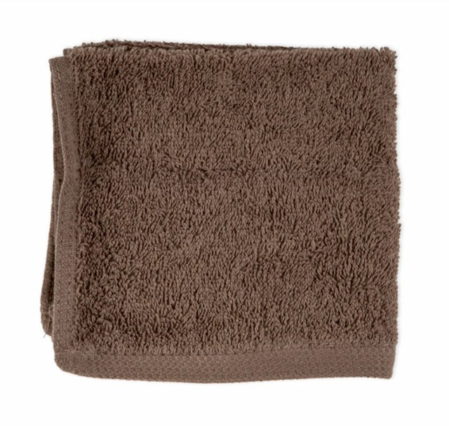 Plush Trinity Walnut bath mat in elegant walnut color, measuring 48x73cm, perfect for absorbing moisture in any bathroom decor.