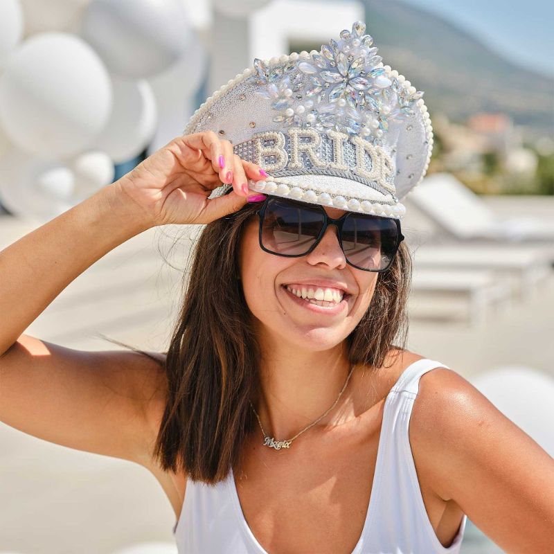 Glamorous rhinestone and pearl embellished hat for bride-to-be, perfect for hen parties and bridal celebrations.