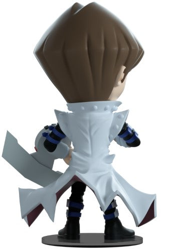 Youtooz Seto Kaiba vinyl figurine holding three Blue-Eyes White Dragon cards, standing 5 inches tall, collectible for fans.