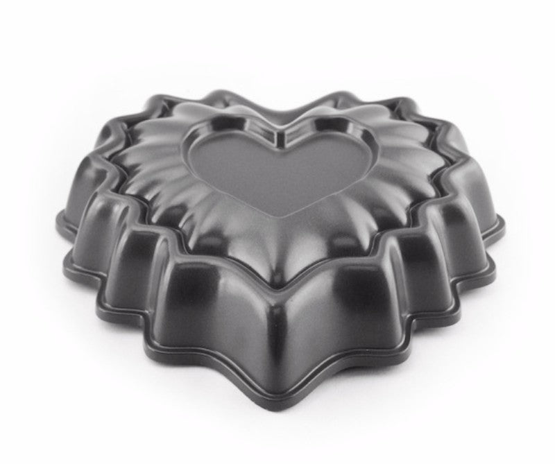Mini Heart Bundt Pan made of heavy aluminum, non-stick finish, 3-cup capacity for charming heart-shaped desserts.