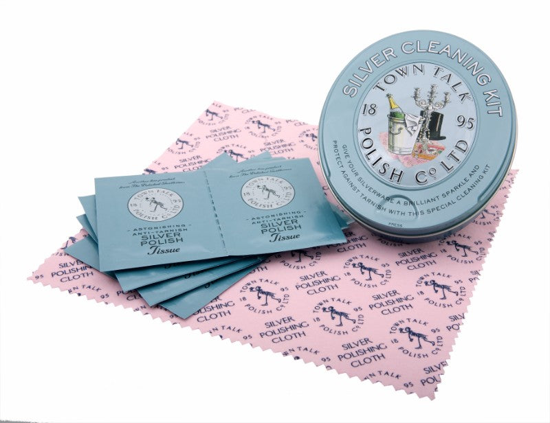 Tinned Silver Cleaning Kit with 8 polish tissues and a cloth for restoring shine, elegantly packed in a decorative tin.