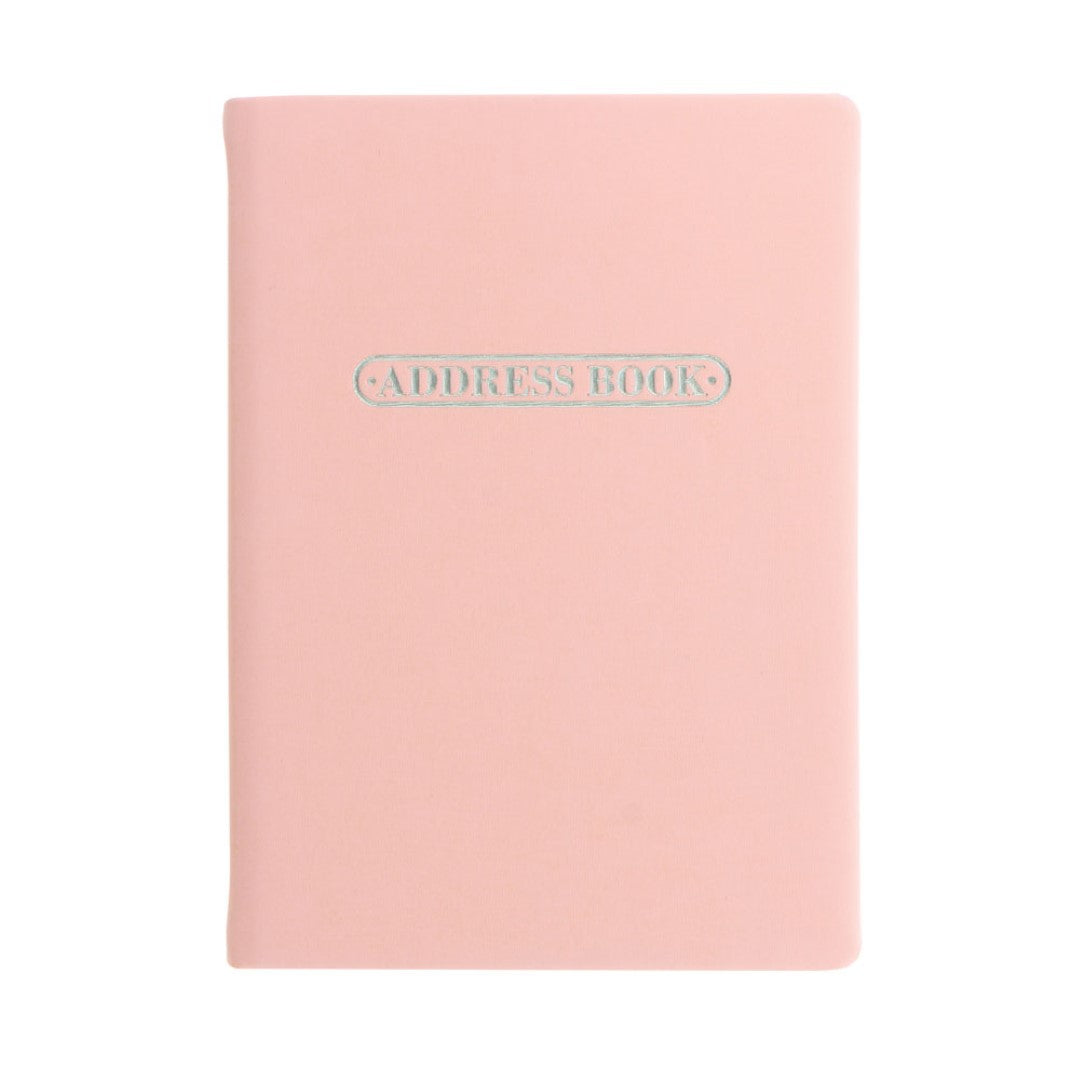 Elegant pastel peach A6 address book with 192 ruled pages, silver foil motifs, and smooth, fountain pen-friendly paper.