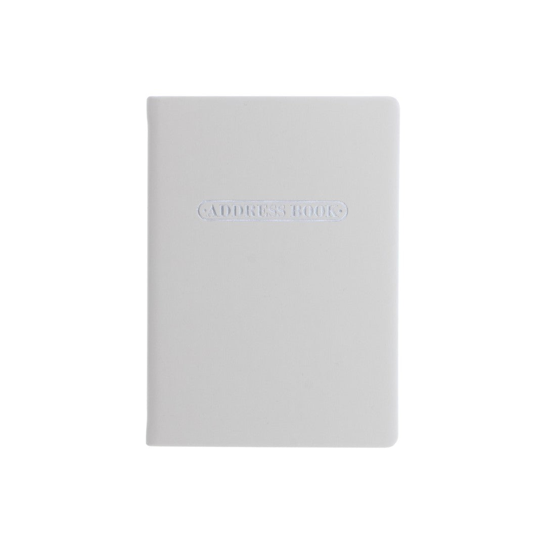 Stylish A6 pastel stone address book with ruled pages, silver foil motif, and durable hard case for organizing contacts.