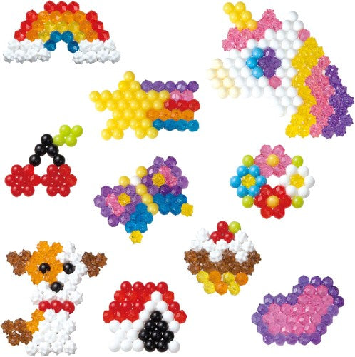 Aquabeads Charm Maker Refill Pack with over 480 colorful beads in various shapes for creative crafts and personalized accessories.