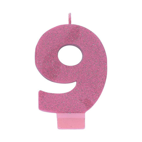 Pink glitter numeral candle in the shape of number 9, 8cm tall, perfect for birthday celebrations.