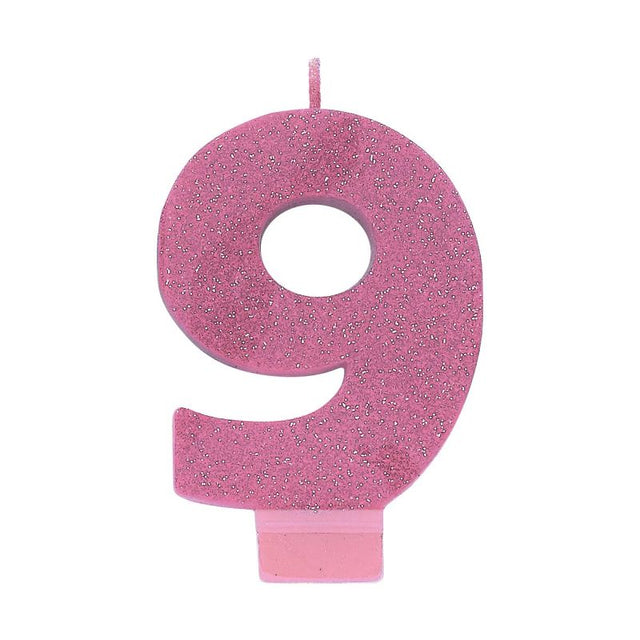 Pink glitter numeral candle in the shape of number 9, 8cm tall, perfect for birthday celebrations.